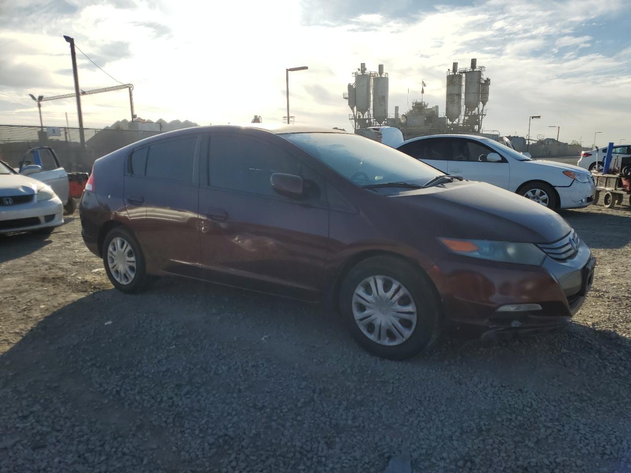 2011 Honda Insight VIN JHMZE2H59BS003960 Copart auction photo, all over damage thumbnail 4
