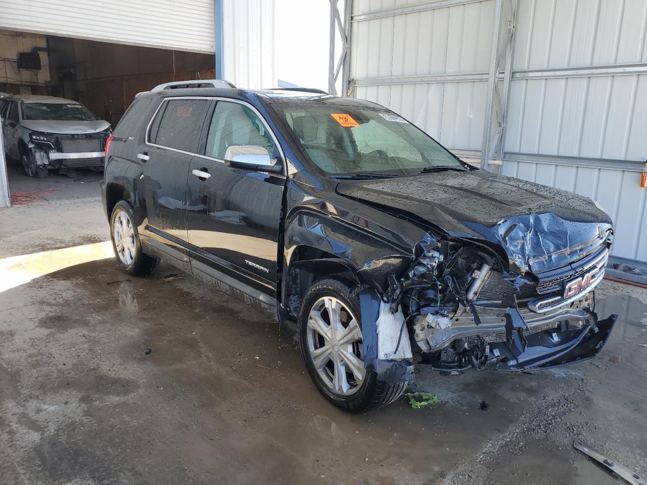 2017 GMC Terrain VIN 2GKALPEK1H6133887 Copart auction photo, front end / vandalism damage thumbnail 4