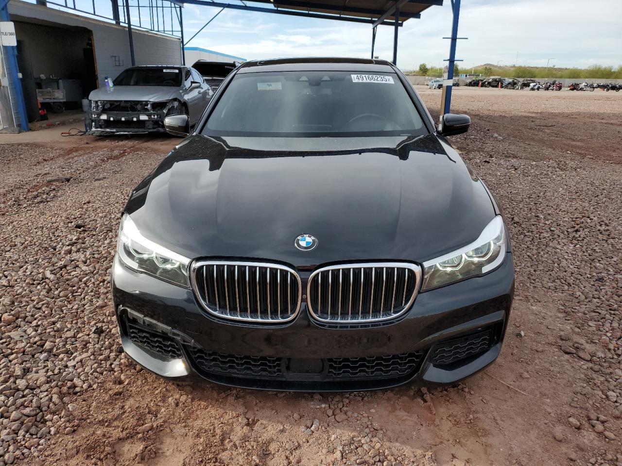 2019 BMW 7er VIN WBA7E2C55KB454929 Copart auction photo, front end damage thumbnail 5