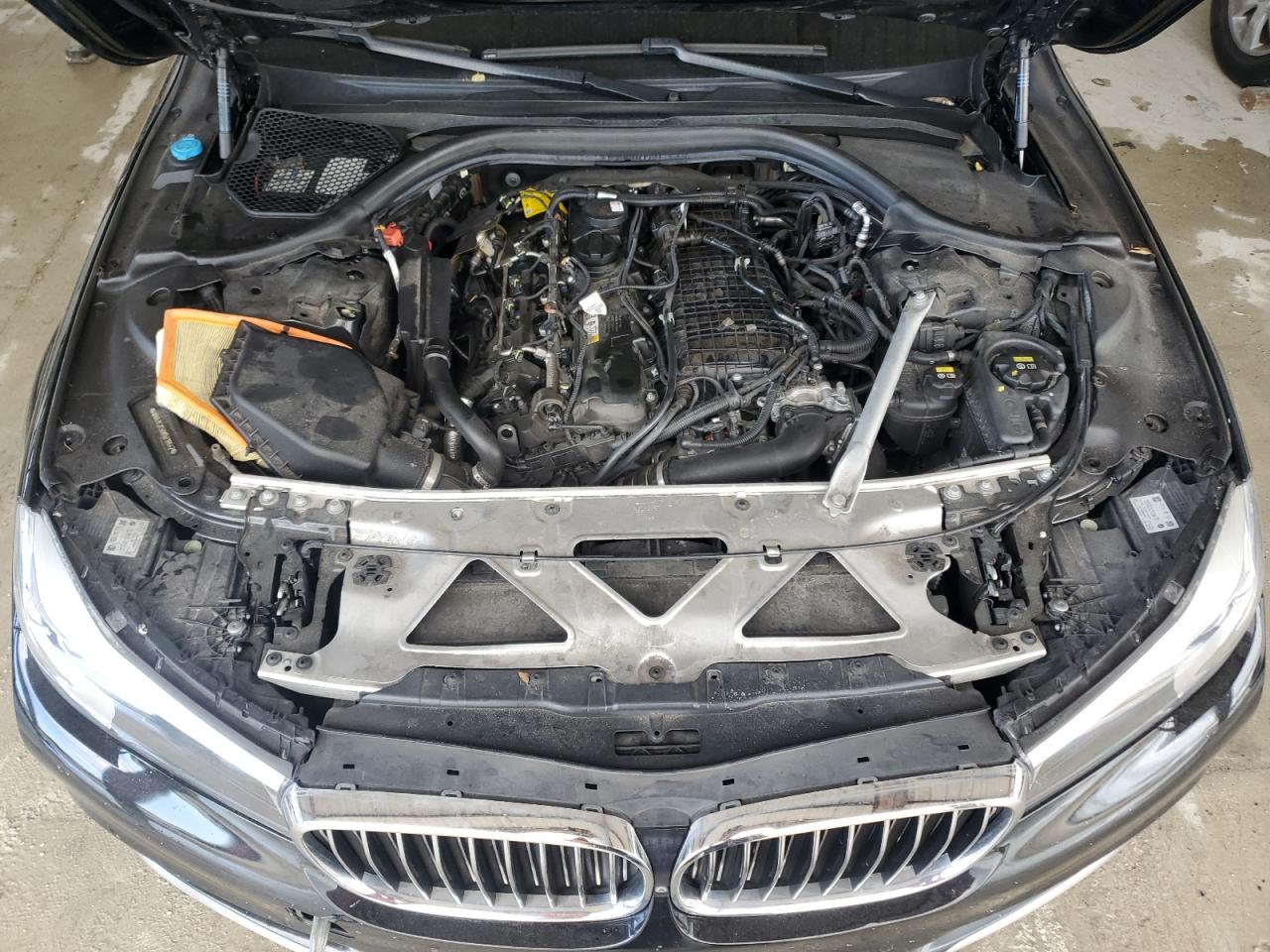 2019 BMW 7er VIN WBA7E2C50KB218642 Copart auction photo, water/flood damage thumbnail 11