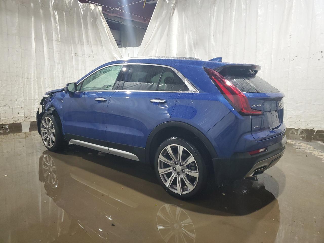 2021 Cadillac XT4 VIN 1GYFZDR49MF044119 Copart auction photo, front end / side damage thumbnail 2