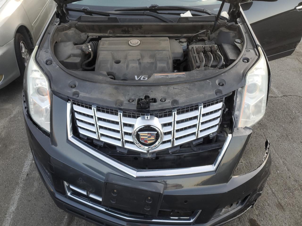 2015 Cadillac SRX VIN 3GYFNBE31FS604100 Copart auction photo, front end damage thumbnail 12