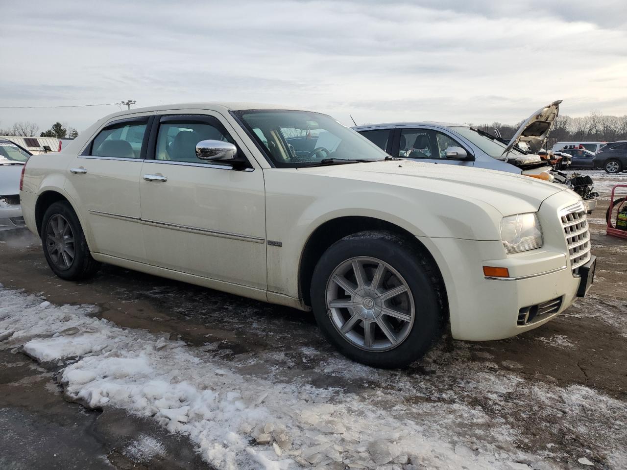 2010 Chrysler 300 VIN 2C3CK5CV4AH331435 Copart auction photo, side / minor dent/scratches damage thumbnail 4
