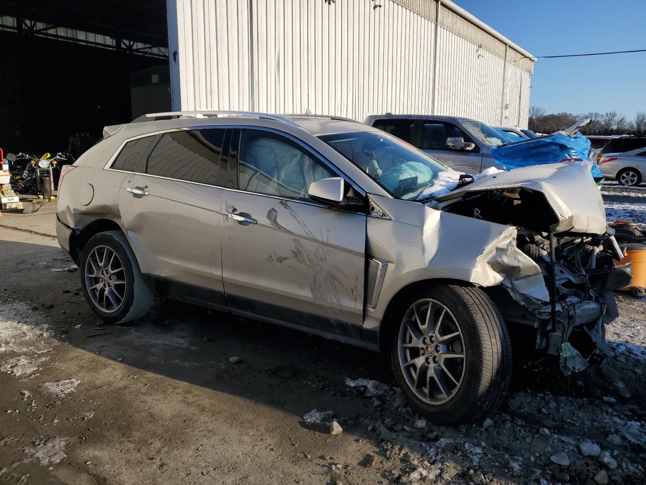 2016 Cadillac SRX VIN 3GYFNCE38GS561771 Copart auction photo, all over damage thumbnail 4