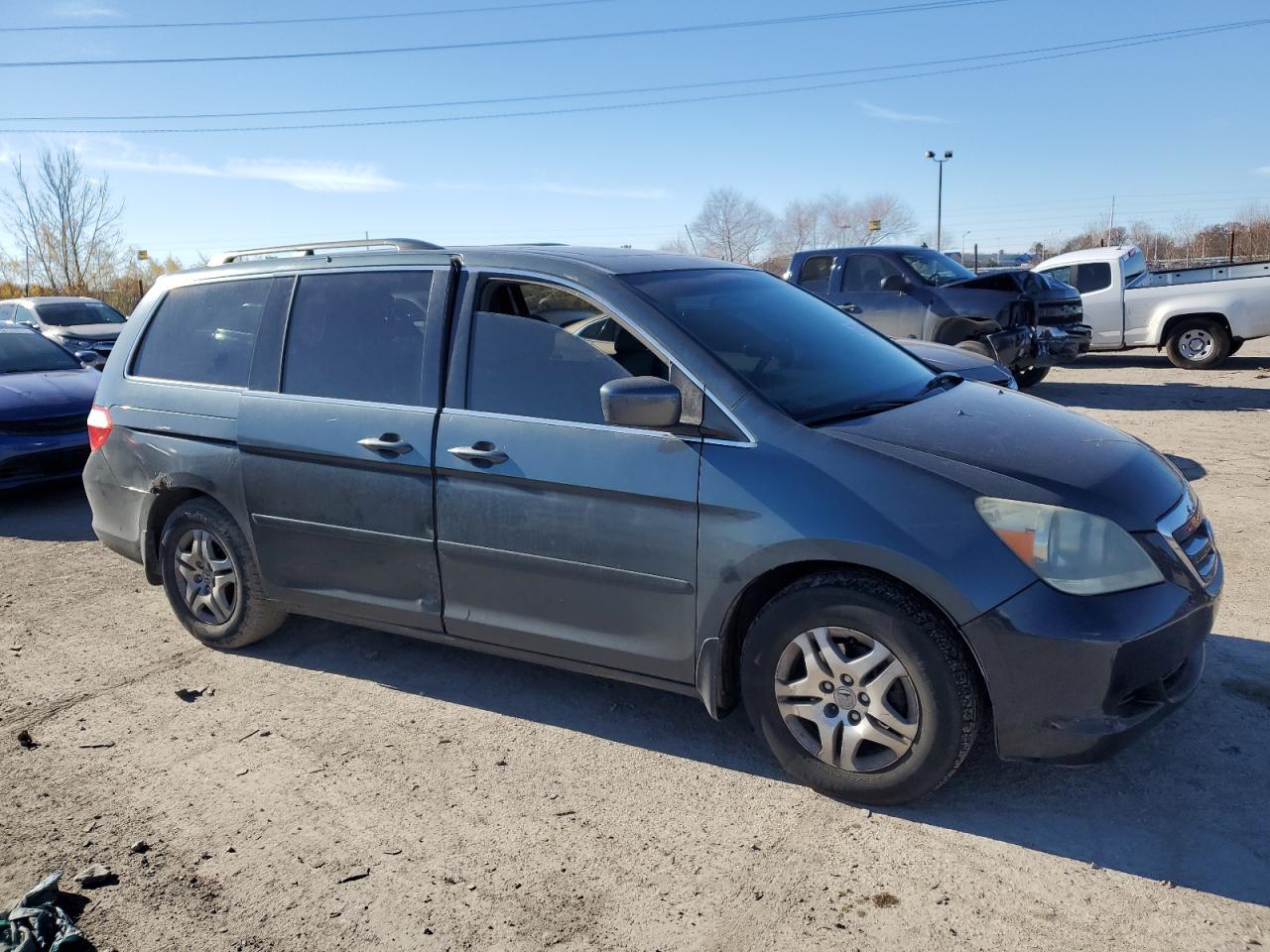 2005 Honda Odyssey VIN 5FNRL38765B115647 Copart auction photo, side / minor dent/scratches damage thumbnail 4