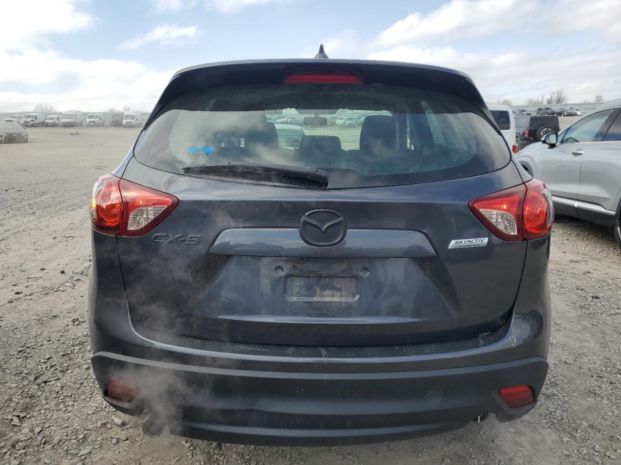2016 Mazda CX-5 VIN JM3KE2CY4G0634114 Copart auction photo, hail damage thumbnail 6