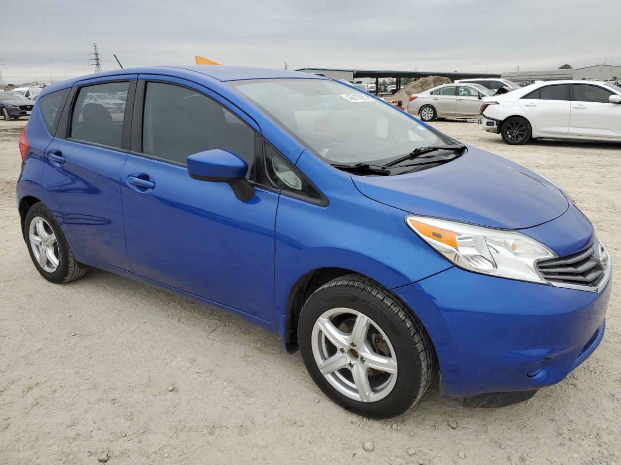 2015 Nissan Versa VIN 3N1CE2CP9FL437285 Copart auction photo, vandalism / minor dent/scratches damage thumbnail 4