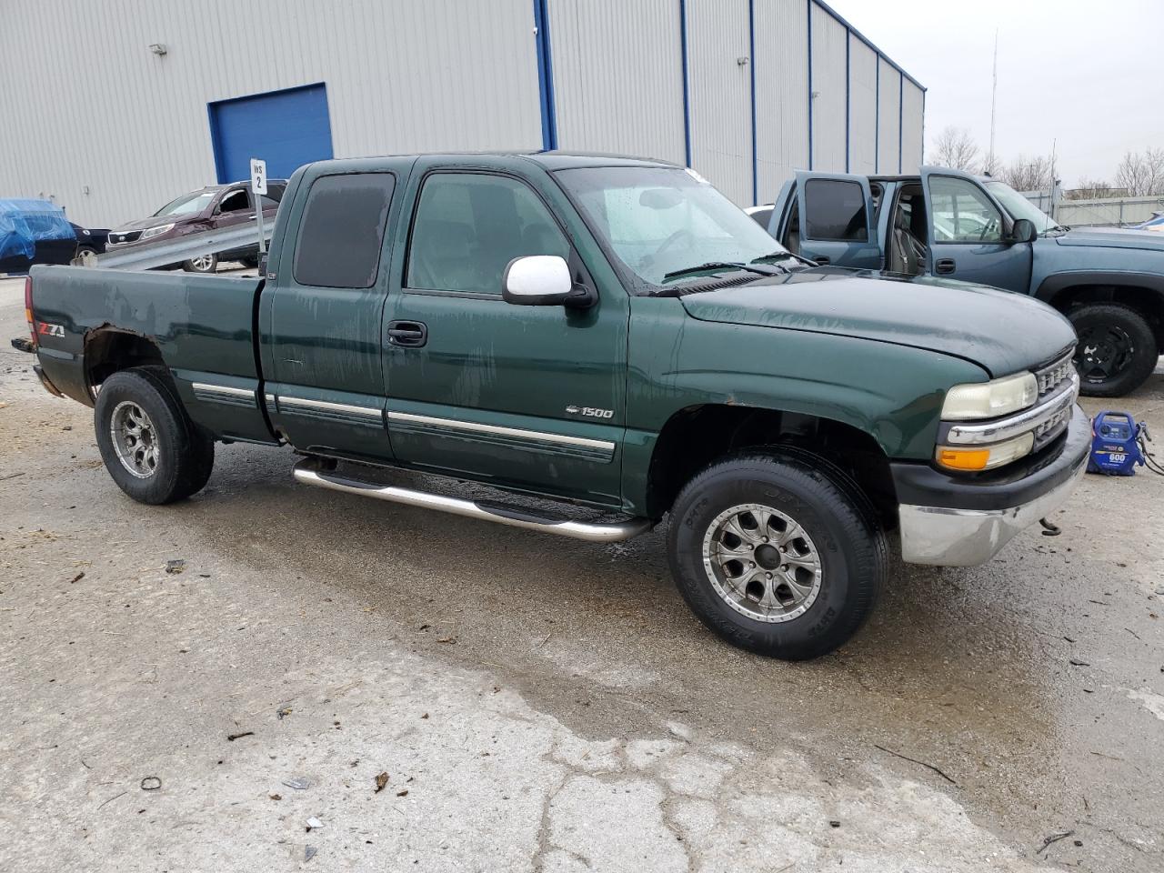 2002 Chevrolet Silverado VIN 2GCEK19T021102330 Copart auction photo, front end damage thumbnail 4