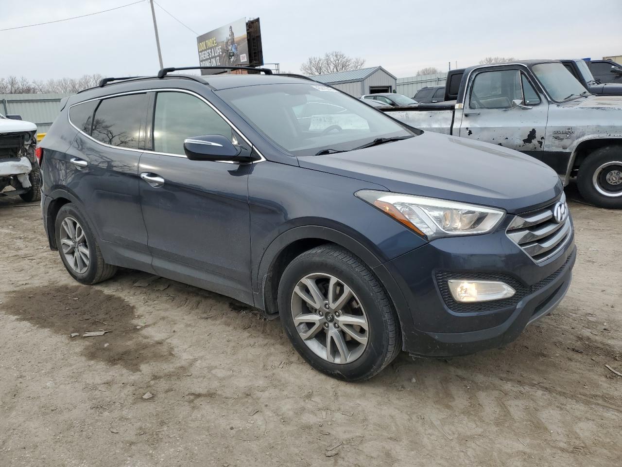 2016 Hyundai Santa Fe VIN 5XYZU3LAXGG346045 Copart auction photo, rear end damage thumbnail 4