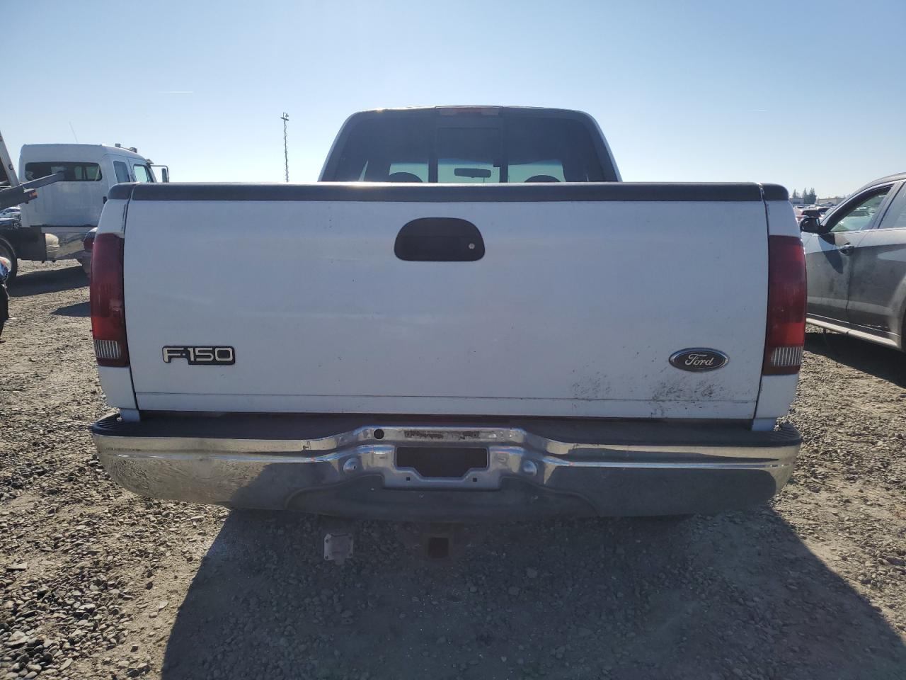 1999 Ford F-150 VIN 1FTRX17WXXKB56340 Copart auction photo, front end / side damage thumbnail 6