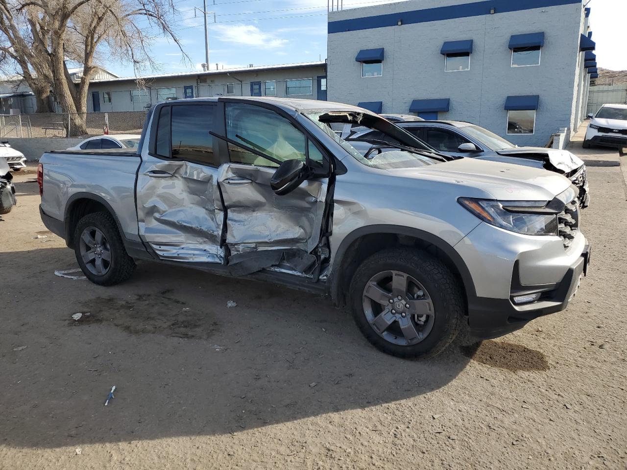 2024 Honda Ridgeline VIN 5FPYK3F66RB000844 Copart auction photo, side damage thumbnail 4