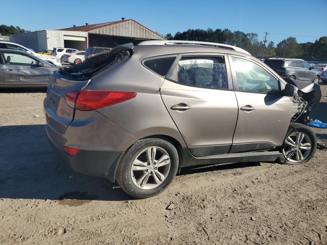 2012 Hyundai Tucson VIN KM8JU3AC6CU340877 Copart auction photo, rollover damage thumbnail 3