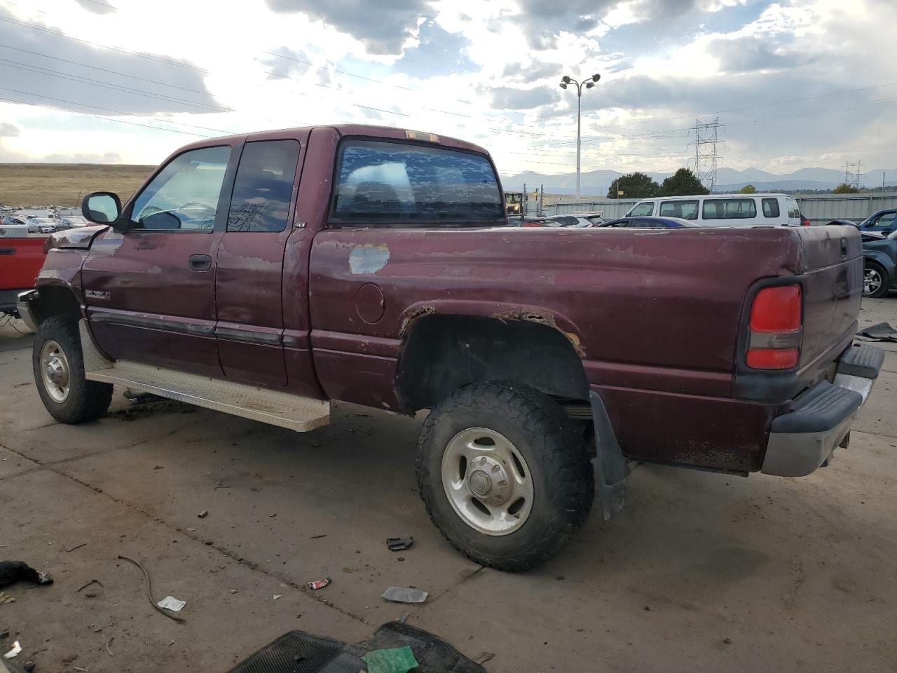 2000 Dodge RAM VIN 3B7KF2368YG140680 Copart auction photo, front end / rear end damage thumbnail 2