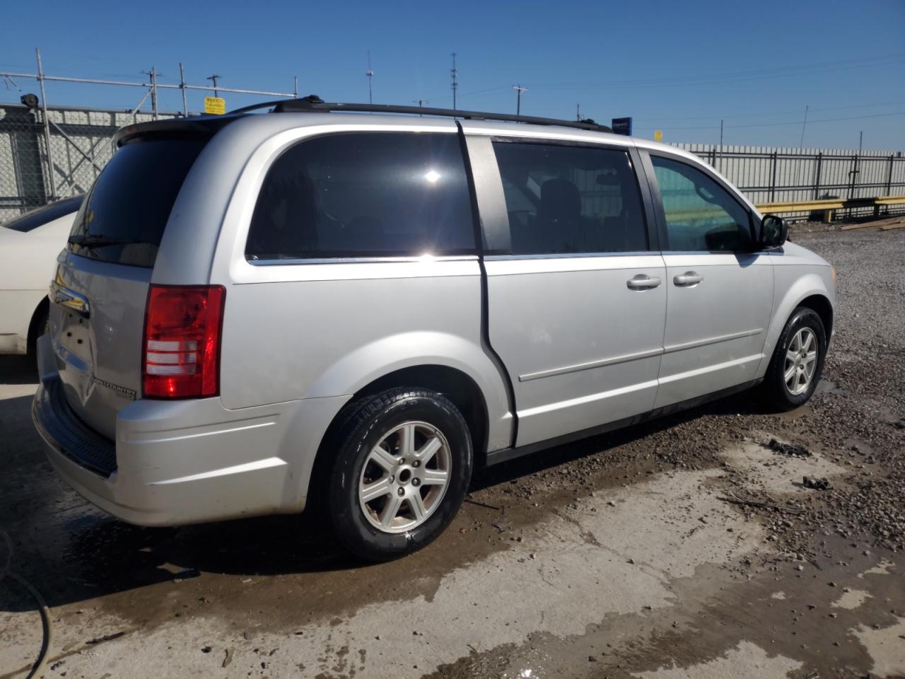 2010 Chrysler Town & Country VIN 2A4RR2D12AR399040 Copart auction photo, side / rear end damage thumbnail 3