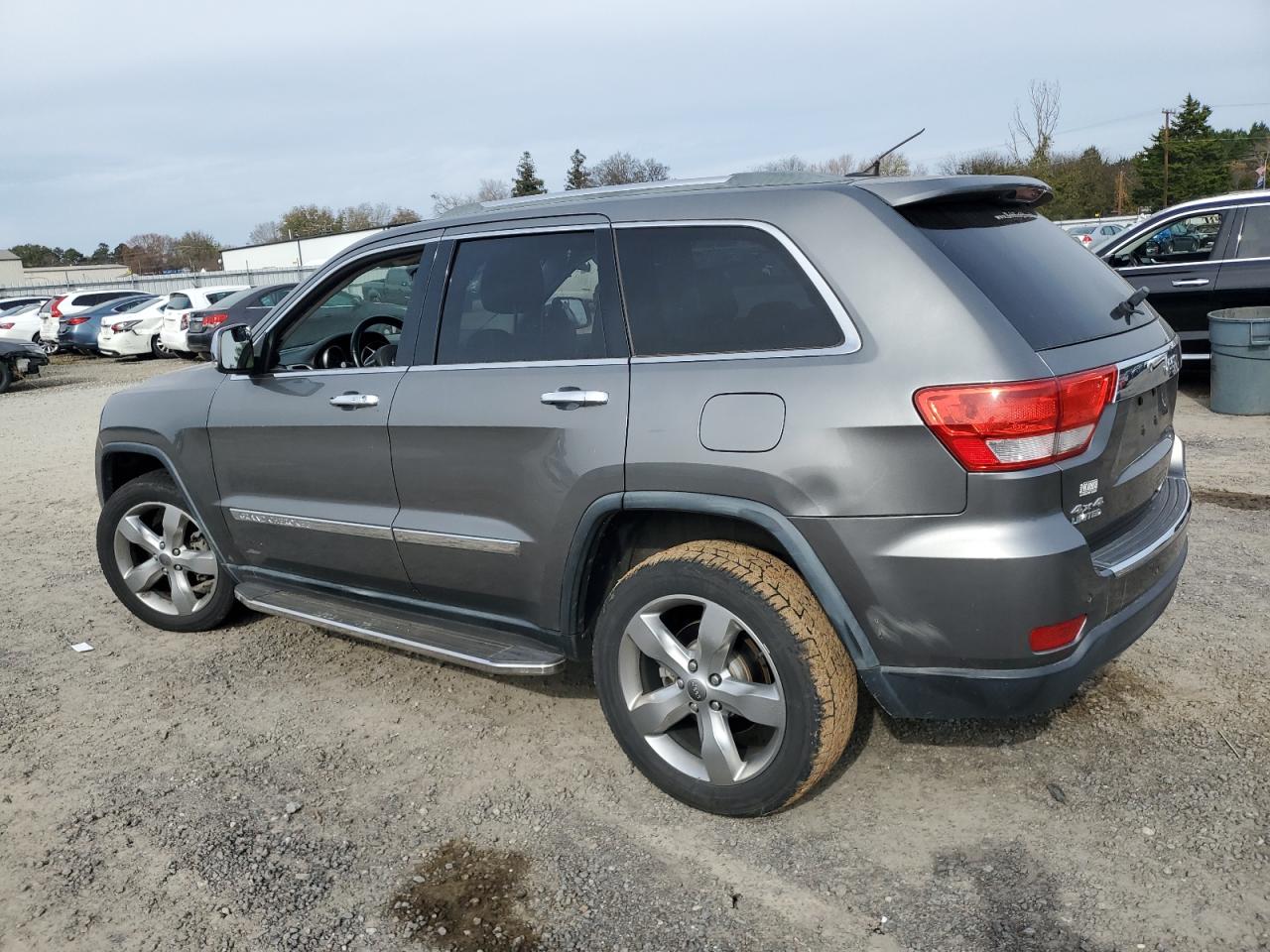 2012 Jeep Grand Cherokee VIN 1C4RJFBG4CC302668 Copart auction photo, front end / undercarriage damage thumbnail 2