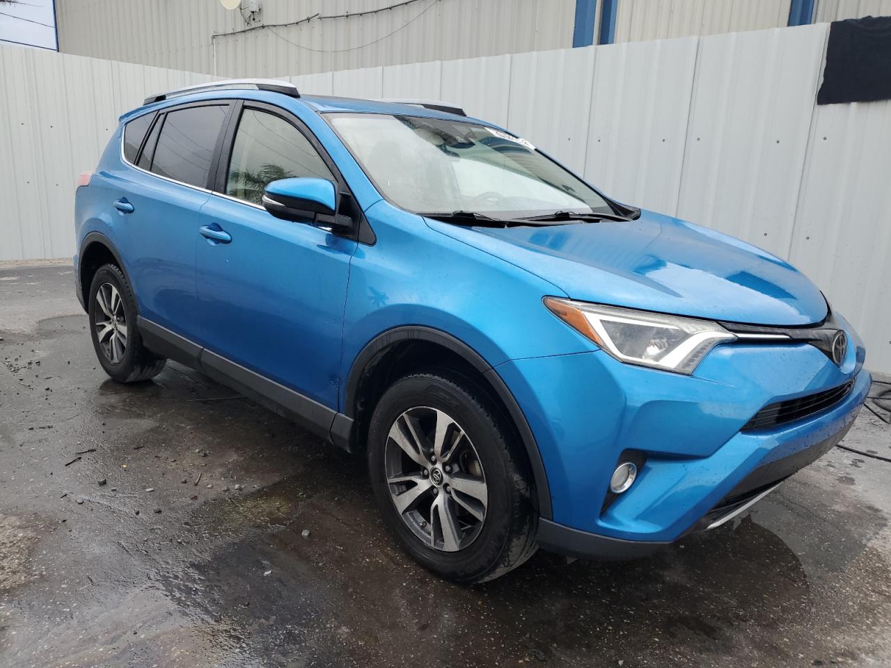 2018 Toyota RAV 4 VIN JTMWFREVXJJ731726 Copart auction photo, normal wear damage thumbnail 4