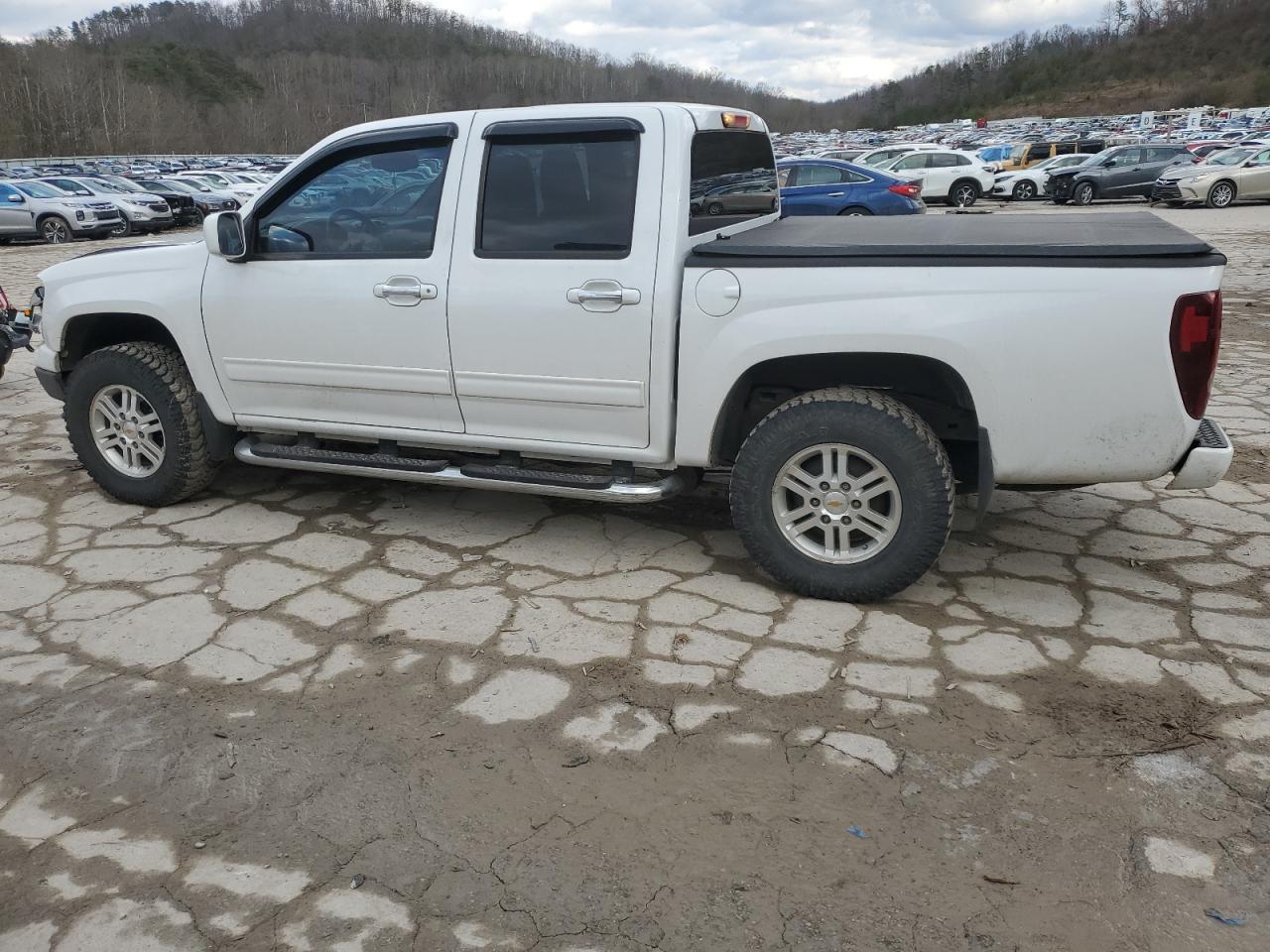 2012 Chevrolet Colorado VIN 1GCHTCFEXC8169527 Copart auction photo, front end / side damage thumbnail 2