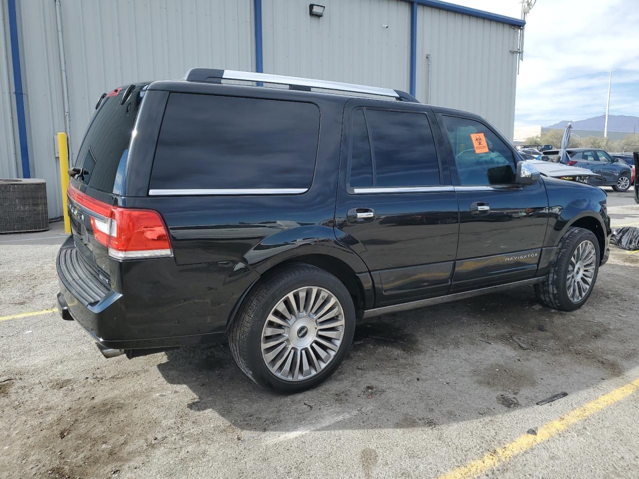 2015 Lincoln Navigator VIN 5LMJJ2HT4FEJ14227 Copart auction photo, front end damage thumbnail 3