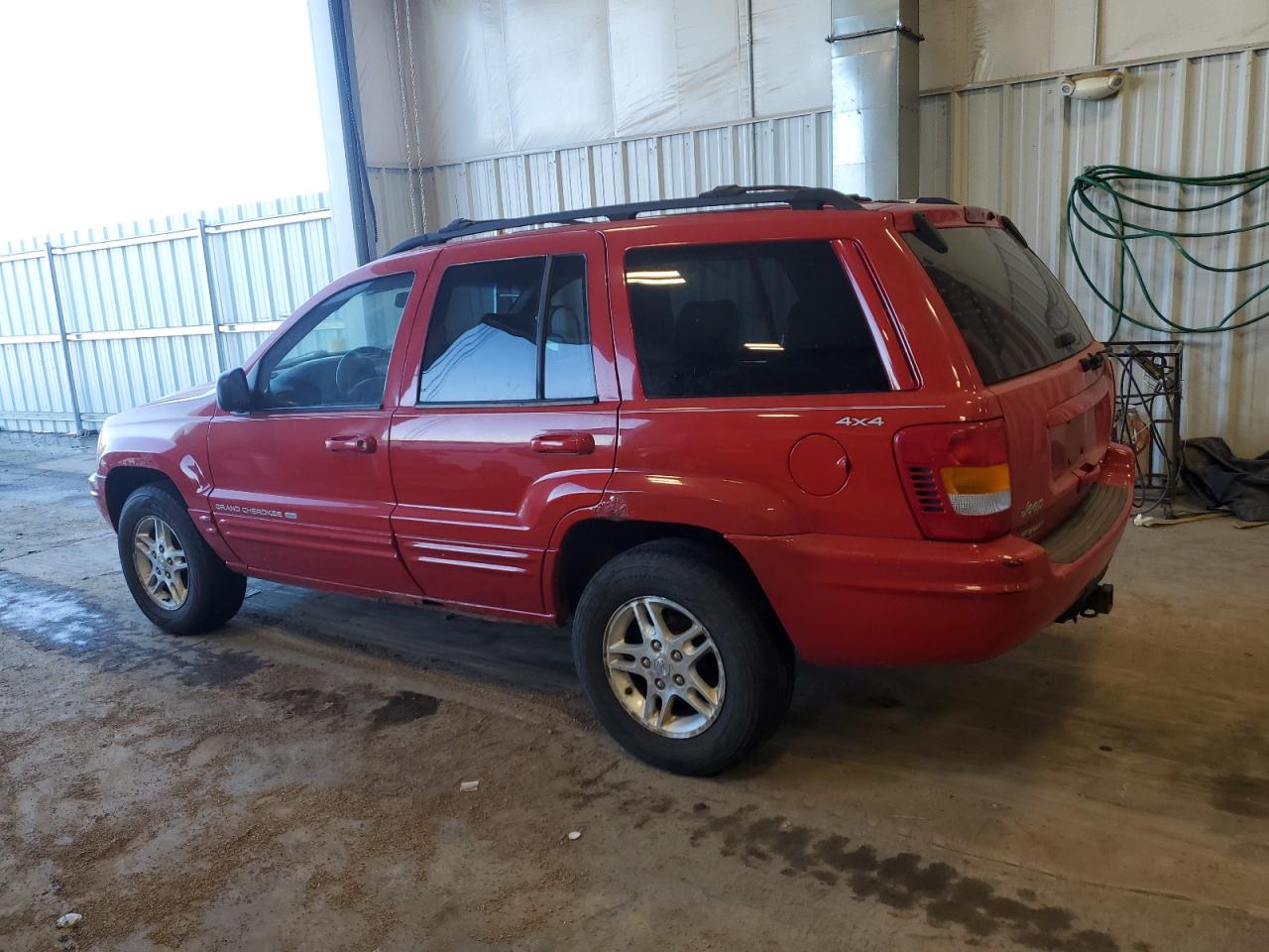 1999 Jeep Grand Cherokee VIN 1J4GW68N3XC702171 Copart auction photo, unknown / minor dent/scratches damage thumbnail 2