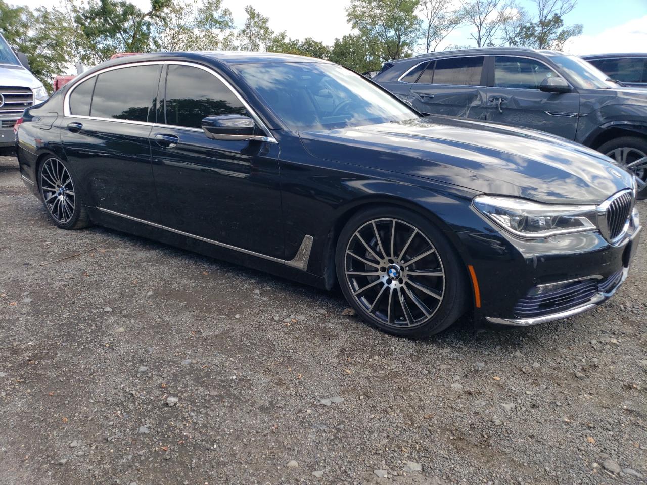 2016 BMW 7er VIN WBA7F2C50GG421005 Copart auction photo, minor dent/scratches damage thumbnail 4