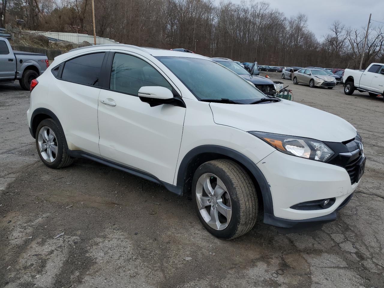 2016 Honda HR-V VIN 3CZRU6H78GM700575 Copart auction photo, rear end / minor dent/scratches damage thumbnail 4