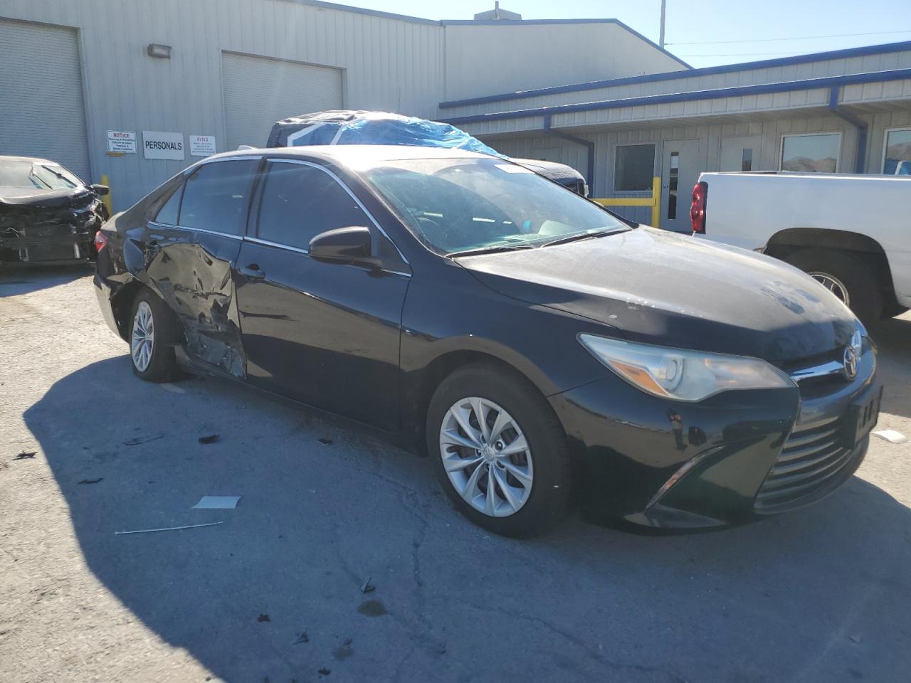 2016 Toyota Camry VIN 4T1BF1FK0GU250634 Copart auction photo, side / rear end damage thumbnail 4