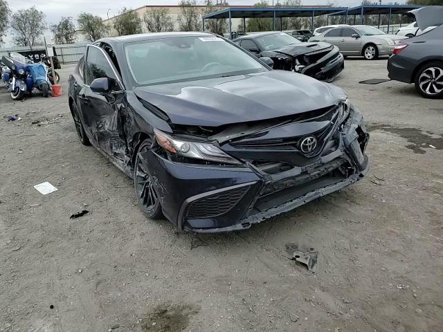 2022 Toyota Camry VIN 4T1K61AKXNU010799 Copart auction photo, side / front end damage thumbnail 11