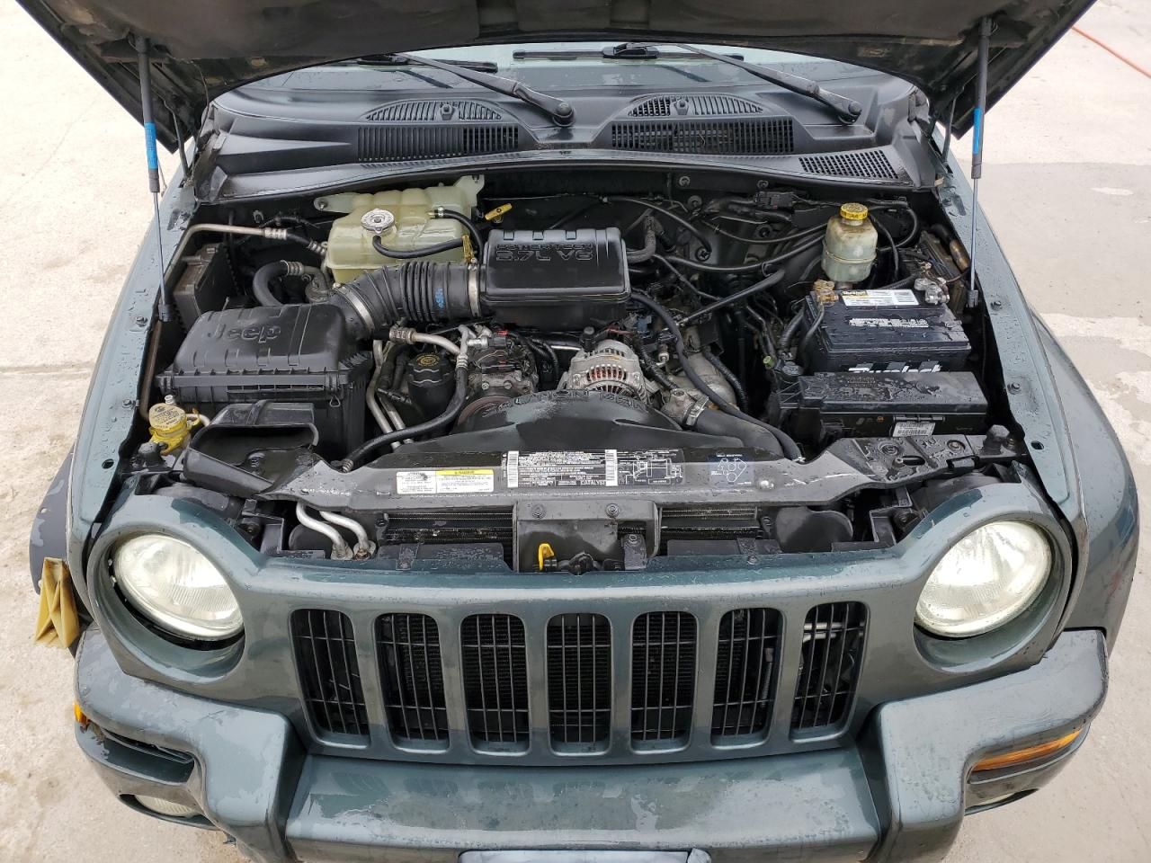 2002 Jeep Liberty (North America) VIN 1J8GL58K12W148983 Copart auction photo, front end / minor dent/scratches damage thumbnail 12
