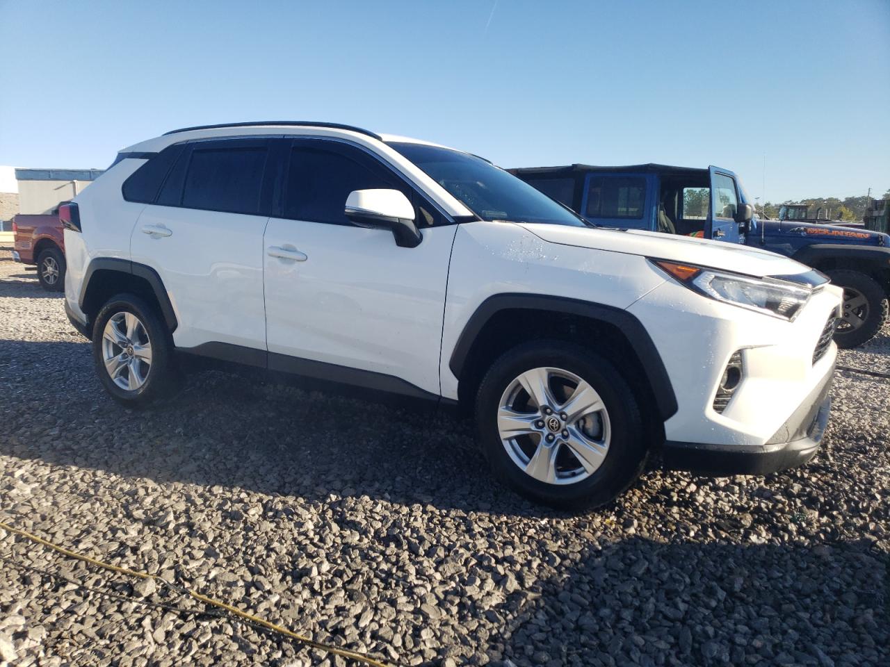 2021 Toyota RAV 4 VIN 2T3W1RFV5MC168881 Copart auction photo, side / front end damage thumbnail 4