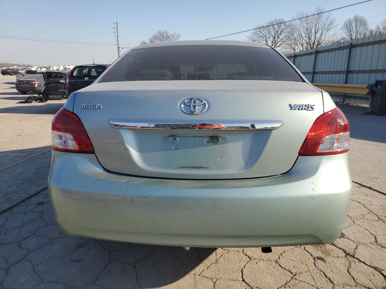 2009 Toyota Yaris VIN JTDBT903791350067 Copart auction photo, front end / rear end damage thumbnail 6