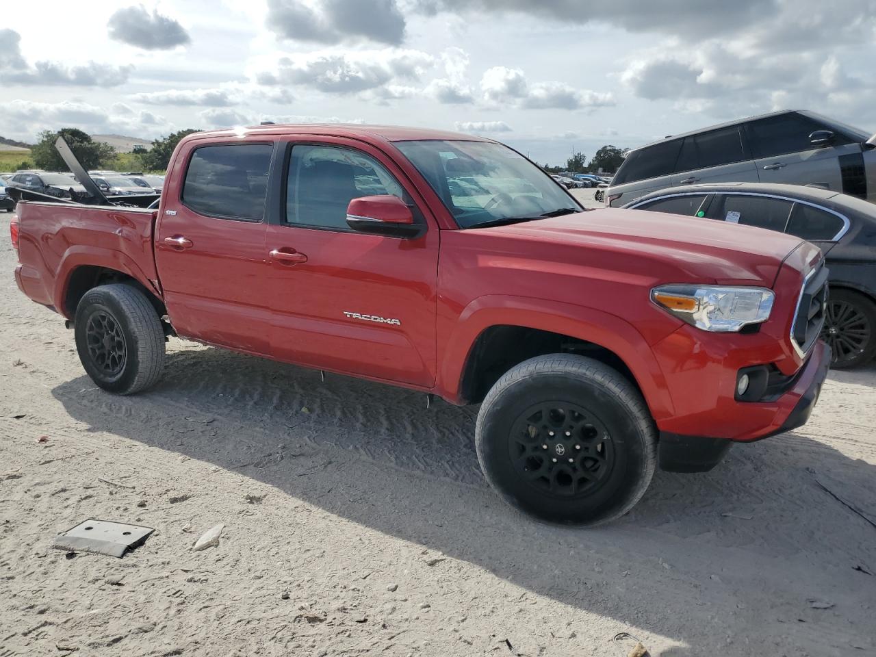 2022 Toyota Tacoma VIN 3TMAZ5CNXNM167839 Copart auction photo, minor dent/scratches damage thumbnail 4