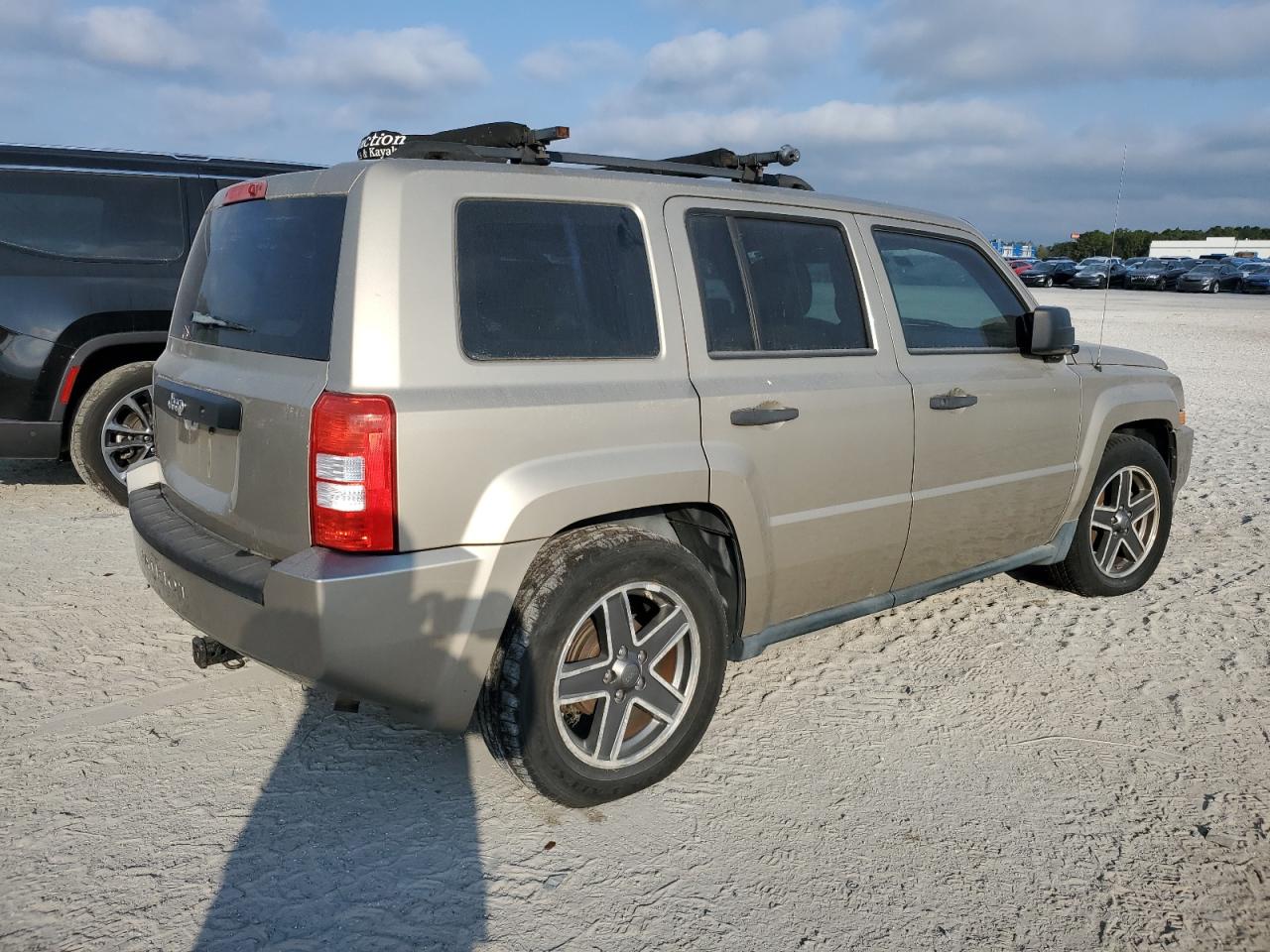 2010 Jeep Liberty (Patriot) VIN 1J4NT2GB4AD503020 Copart auction photo, minor dent/scratches damage thumbnail 3
