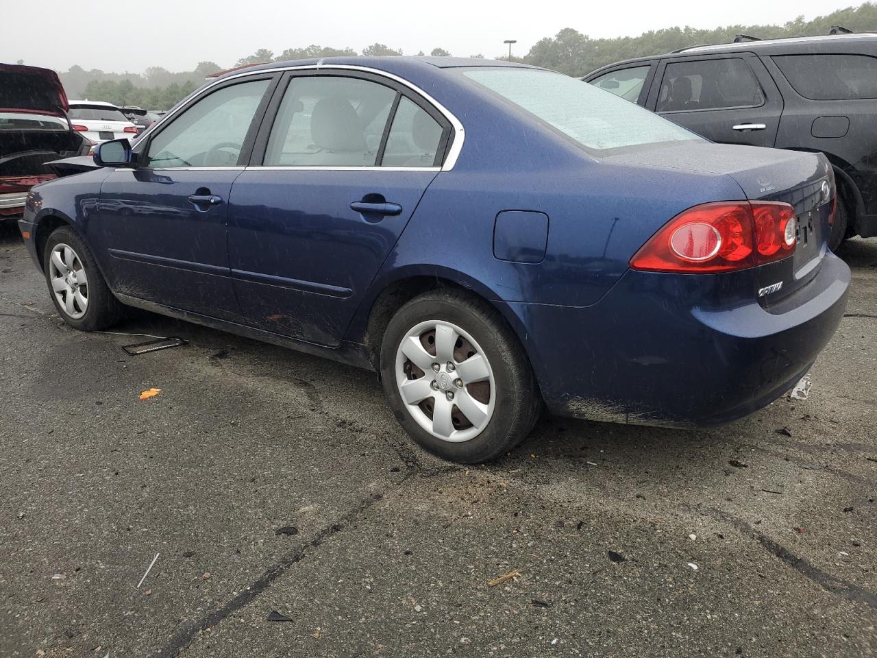 2006 KIA Optima VIN KNAGE123365070775 Copart auction photo, front end / minor dent/scratches damage thumbnail 2