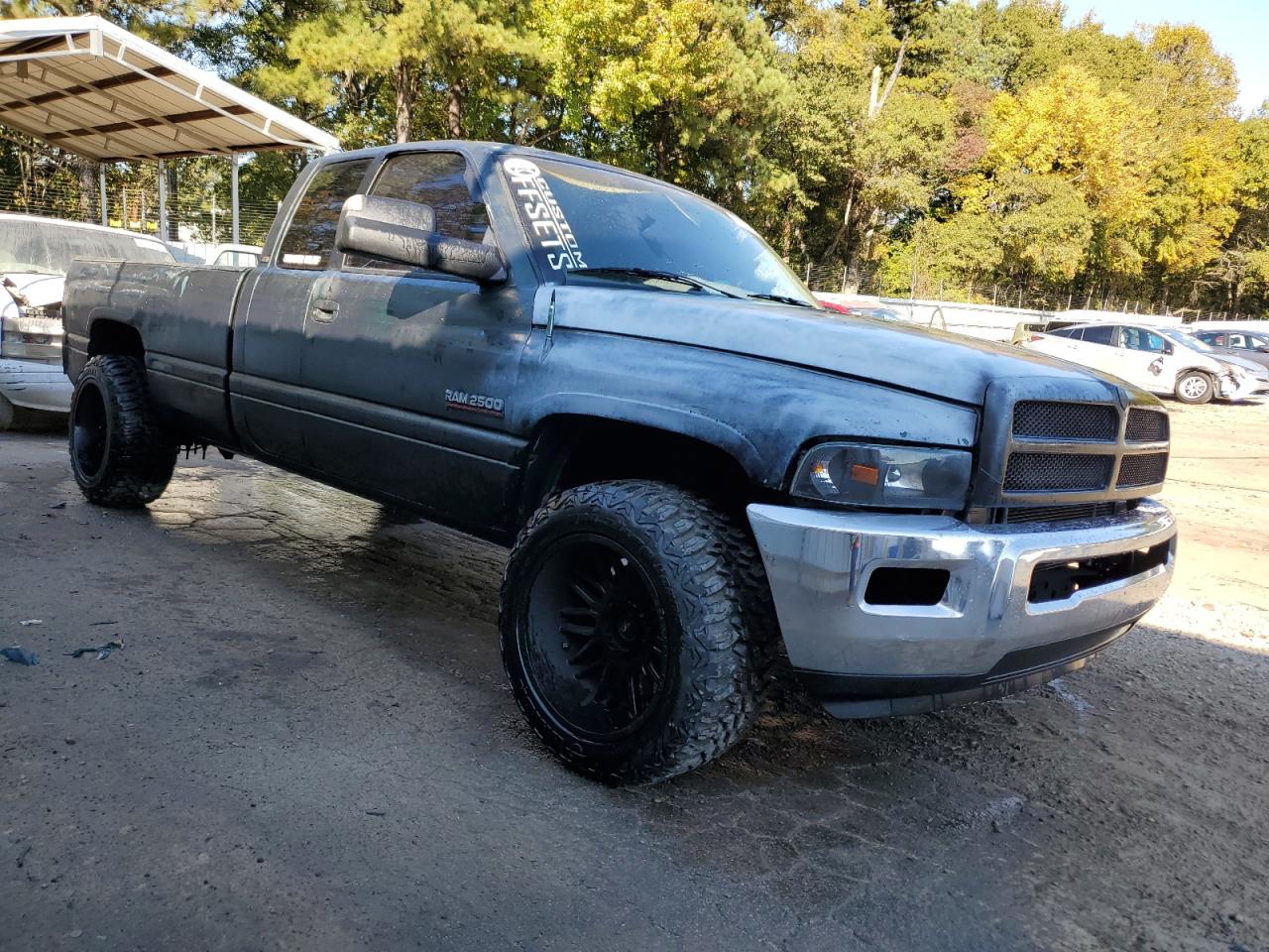 1999 Dodge RAM VIN 1B7KC2368XJ548487 Copart auction photo, all over damage thumbnail 4