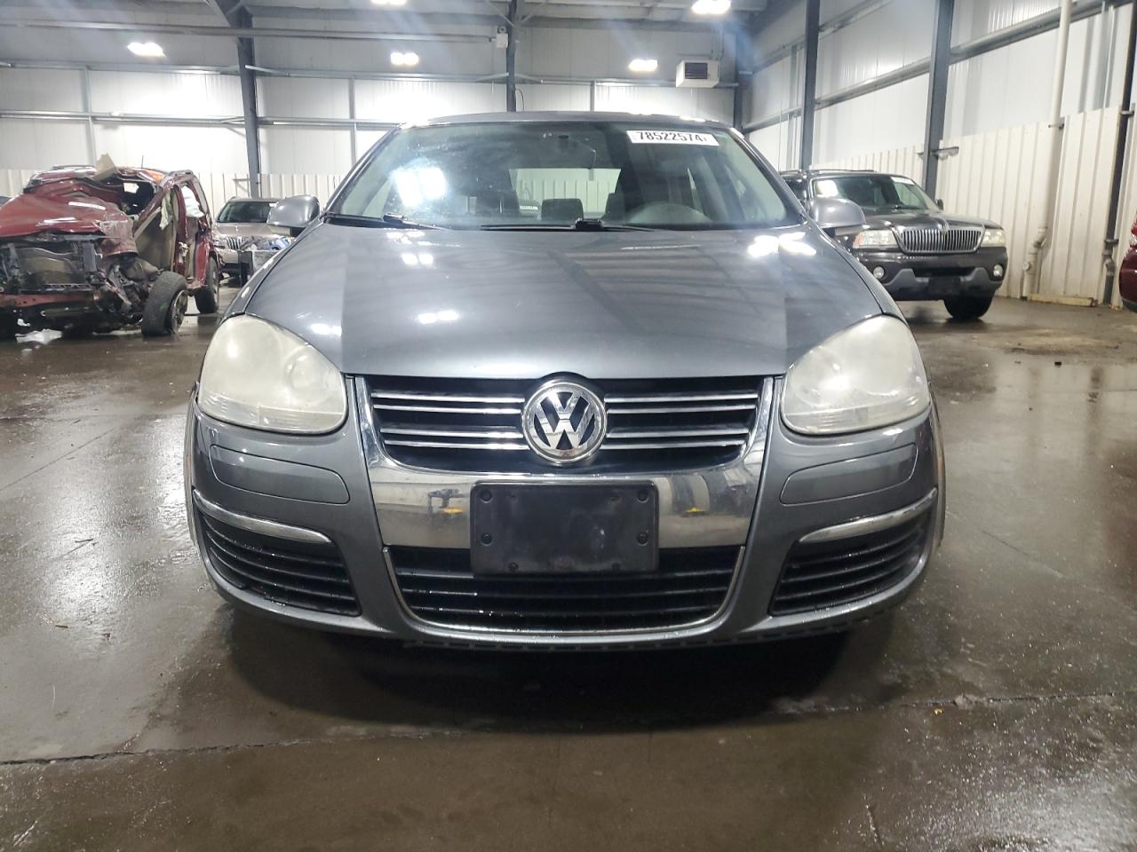 2009 Volkswagen Jetta VIN 3VWJM71K29M096058 Copart auction photo, undercarriage damage thumbnail 5