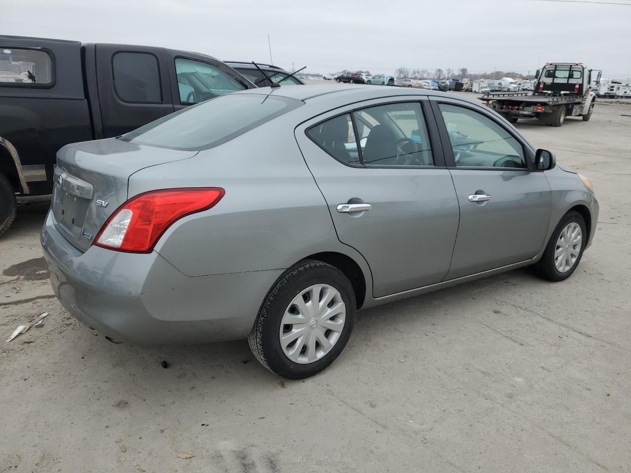 2012 Nissan Versa VIN 3N1CN7AP6CL820970 Copart auction photo, side / front end damage thumbnail 3