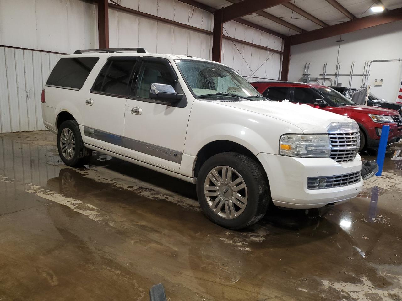 2011 Lincoln Navigator VIN 5LMJJ3J52BEJ09099 Copart auction photo, front end / side damage thumbnail 4