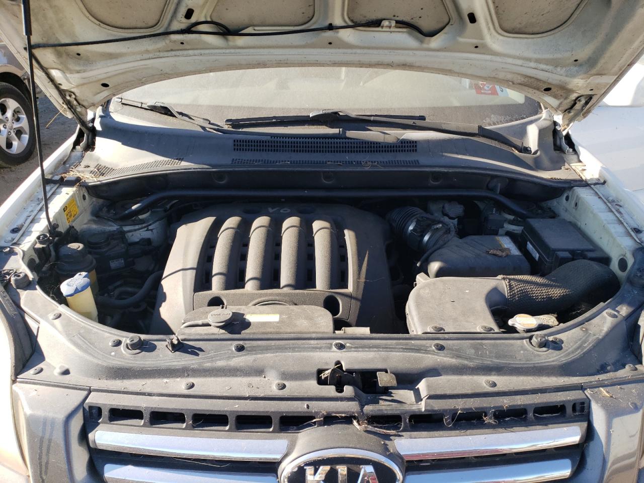 2007 KIA Sportage VIN KNDJE723277343349 Copart auction photo, rear end / minor dent/scratches damage thumbnail 12