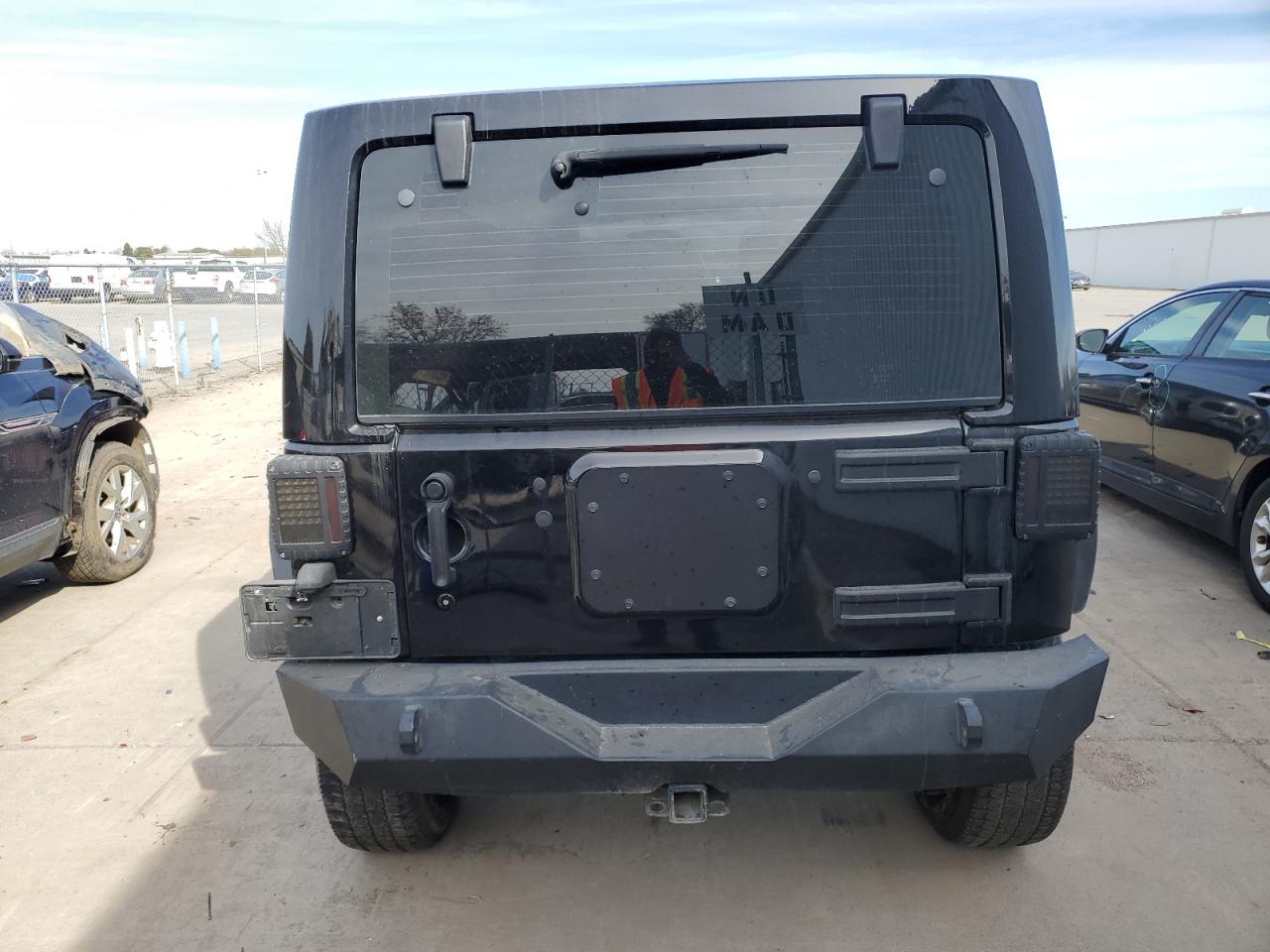 2016 Jeep Wrangler VIN 1C4BJWDG0GL280057 Copart auction photo, side damage thumbnail 6