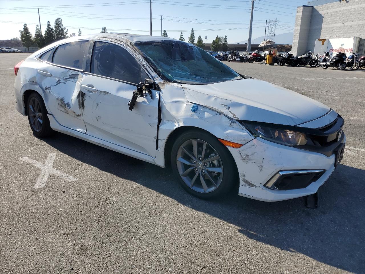 2021 Honda Civic VIN 19XFC1F37ME205577 Copart auction photo, all over damage thumbnail 4