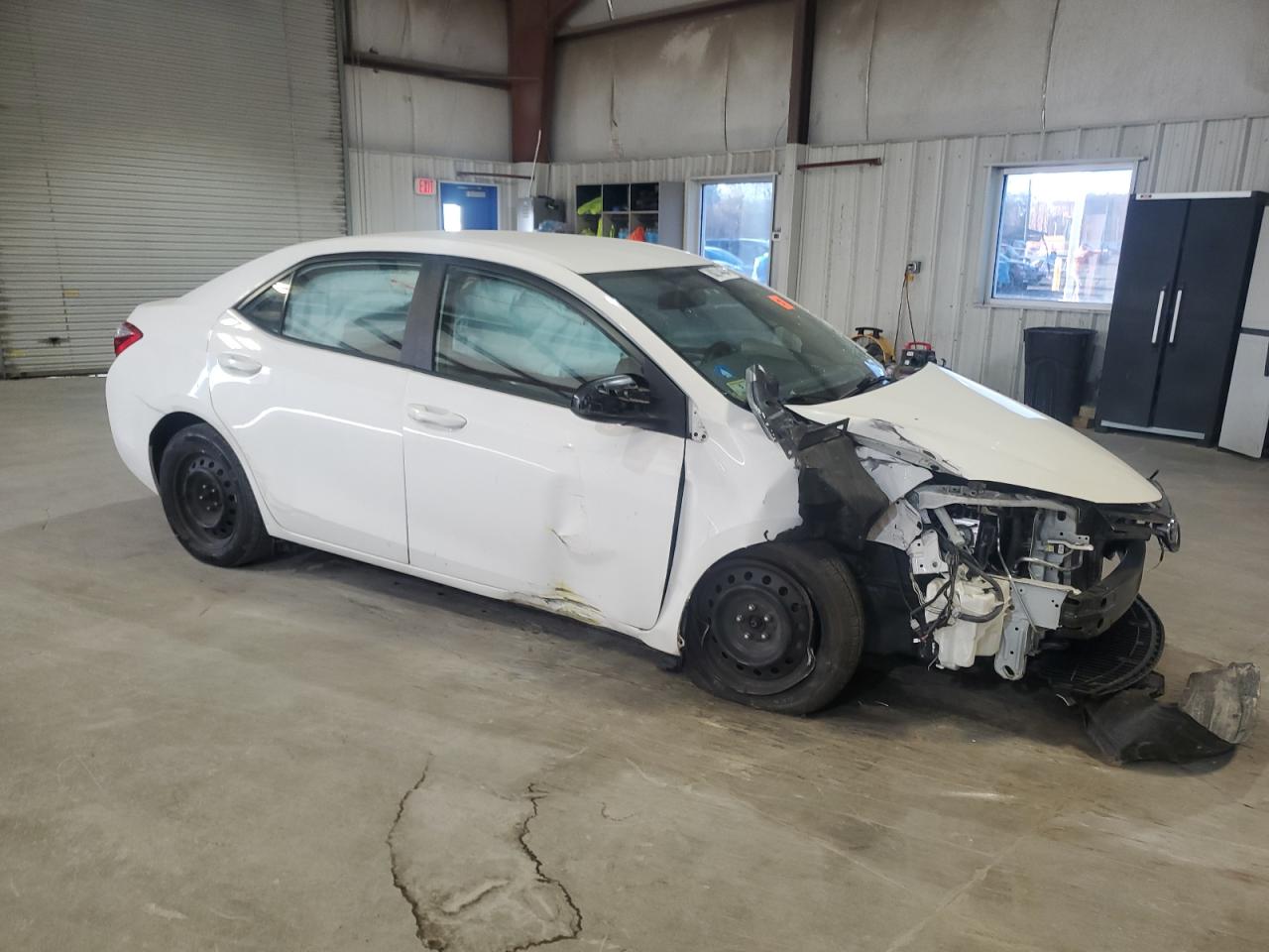 2015 Toyota Corolla VIN 2T1BURHE7FC286194 Copart auction photo, front end / side damage thumbnail 4