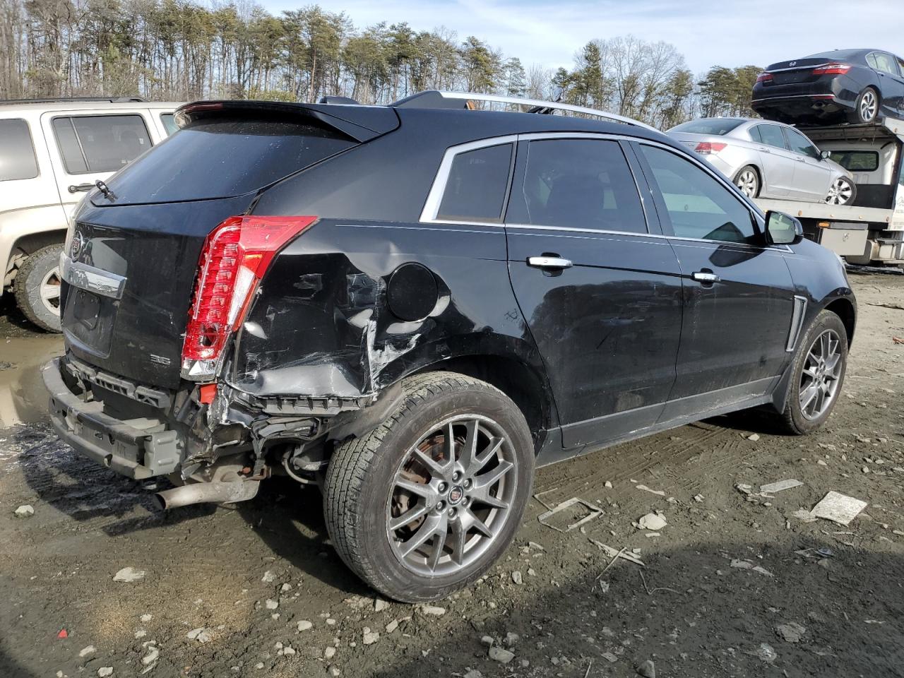 2016 Cadillac SRX VIN 3GYFNCE30GS522849 Copart auction photo, rear end / undercarriage damage thumbnail 3