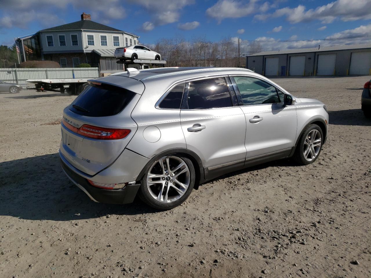 2015 Lincoln MKZ VIN 5LMCJ2A92FUJ04115 Copart auction photo, rear end / minor dent/scratches damage thumbnail 3