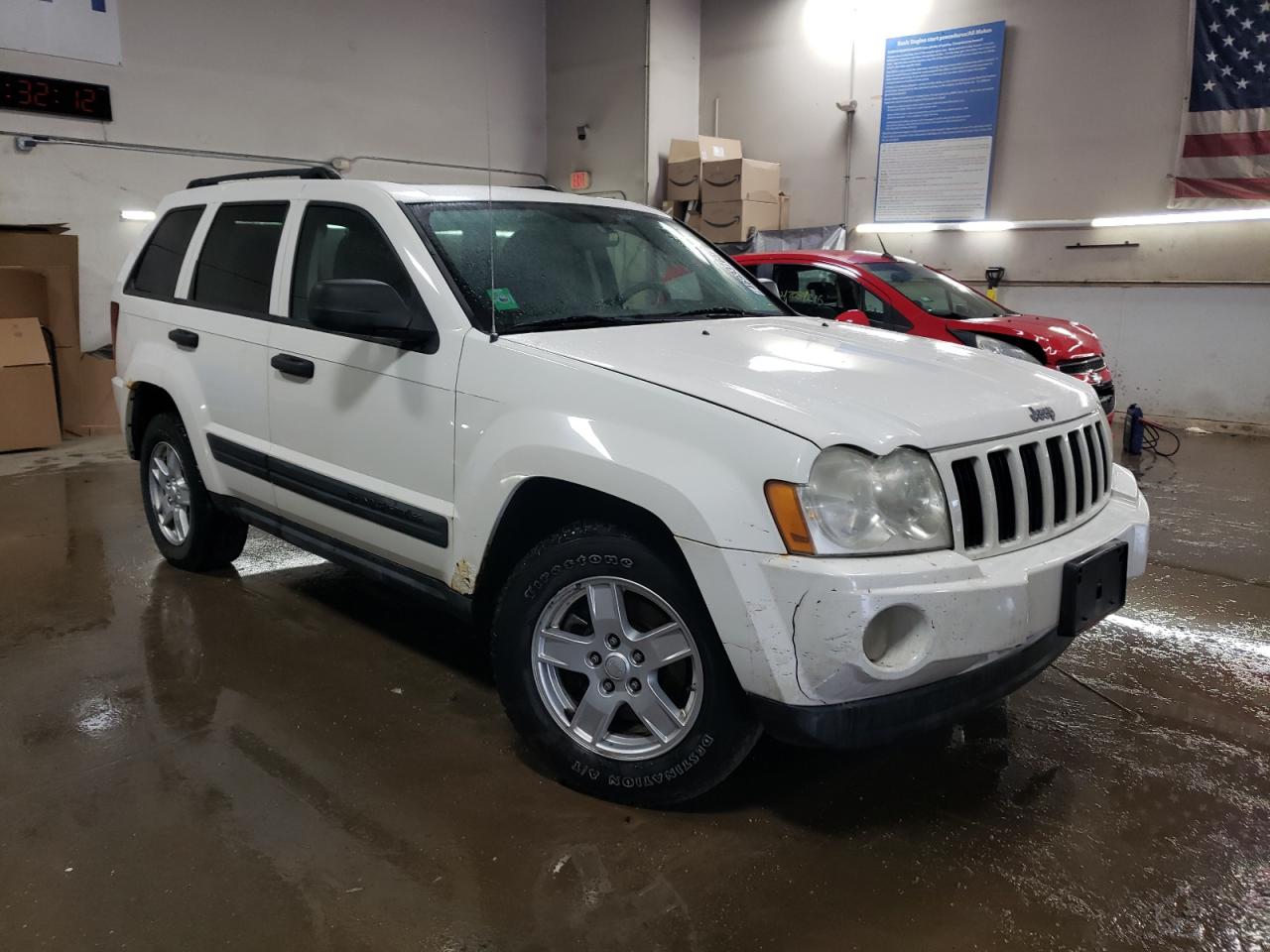 2005 Jeep Grand Cherokee VIN 1J4HR48N75C679152 Copart auction photo, front end damage thumbnail 4
