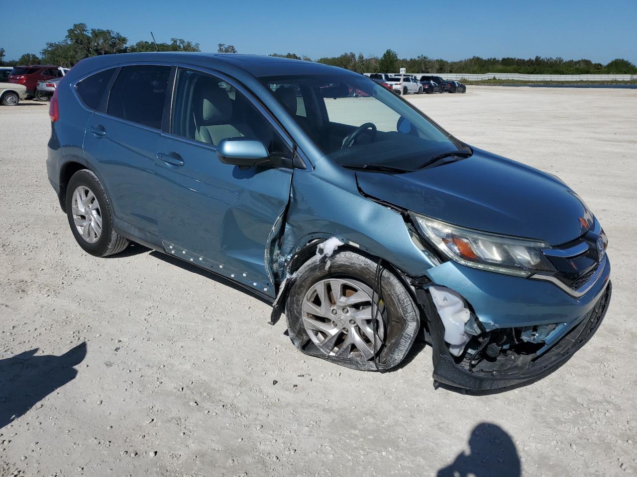 2015 Honda CR-V VIN 2HKRM3H57FH534931 Copart auction photo, side / front end damage thumbnail 4
