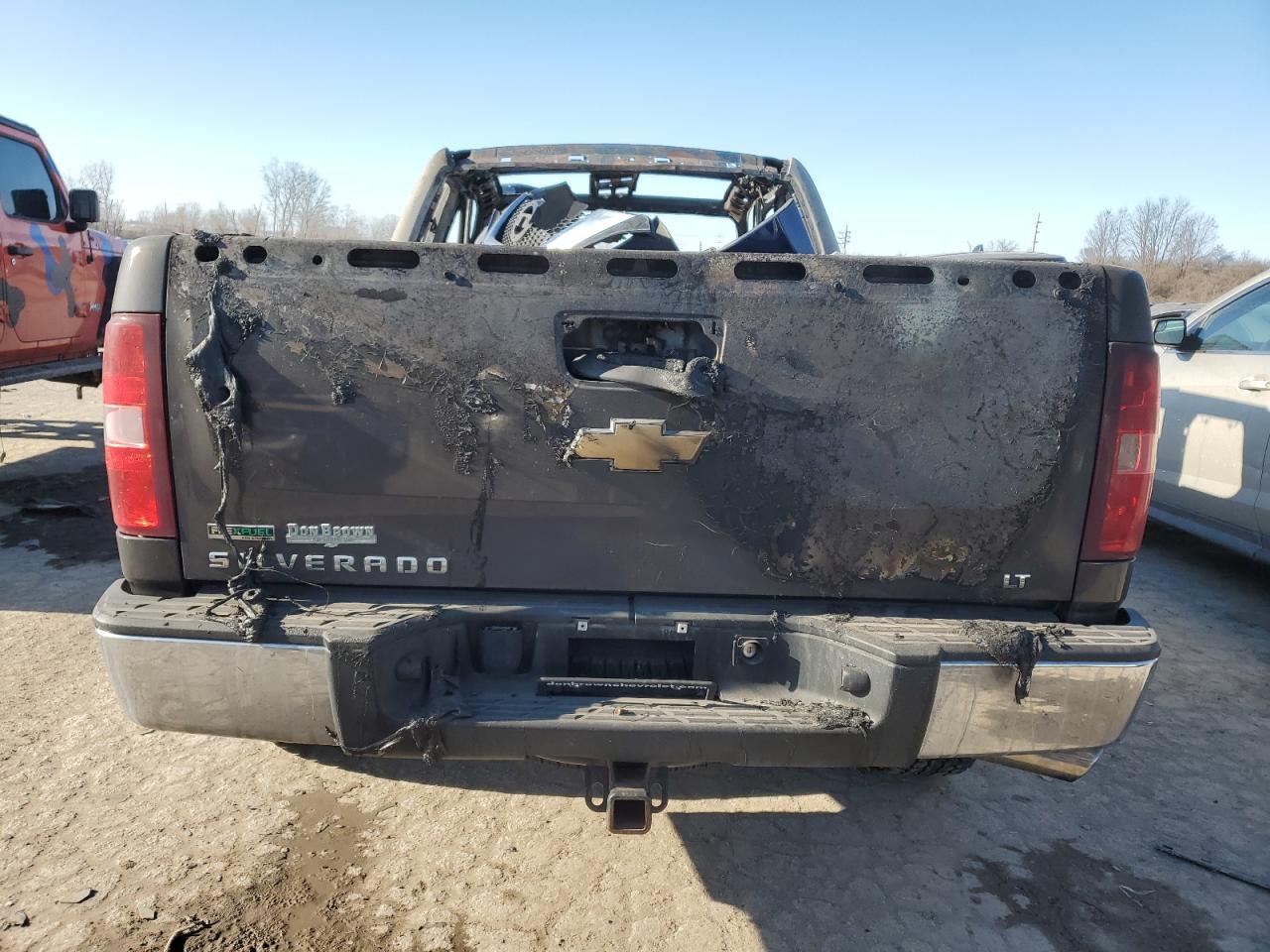 2011 Chevrolet Silverado VIN 1GCRKSE34BZ253319 Copart auction photo, burn damage thumbnail 6