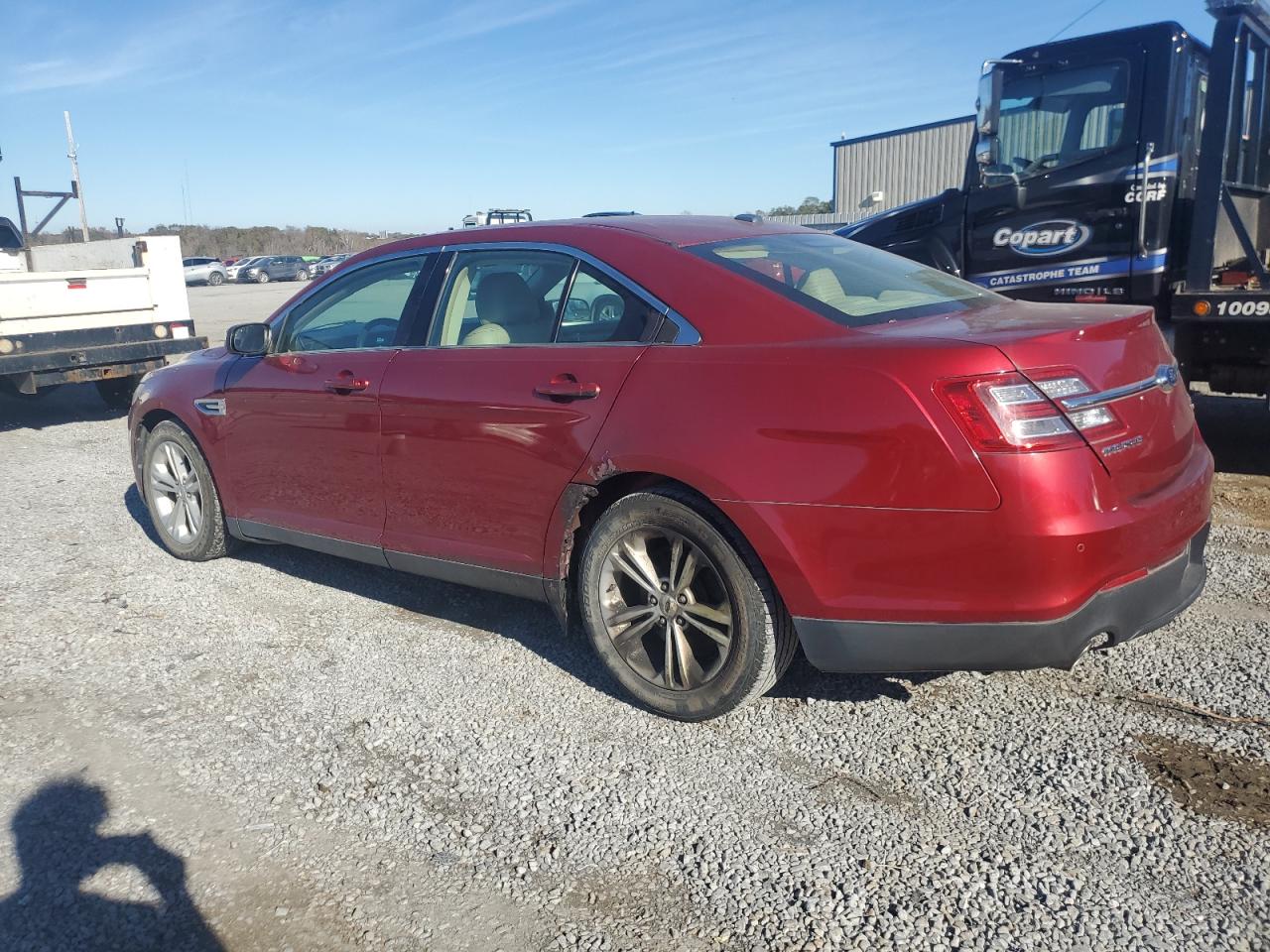 2015 Ford Taurus VIN 1FAHP2H83FG194761 Copart auction photo, burn / rear end damage thumbnail 2