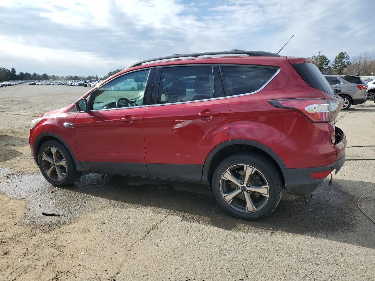 2017 Ford Escape VIN 1FMCU0GDXHUB29387 Copart auction photo, rear end damage thumbnail 2