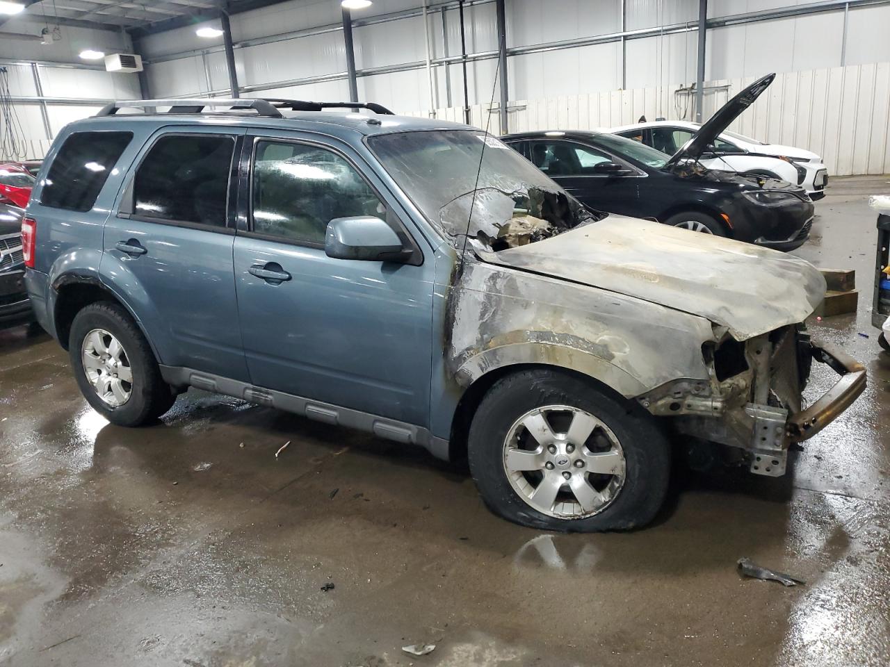 2012 Ford Escape VIN 1FMCU9EG6CKA85765 Copart auction photo, burn damage thumbnail 4