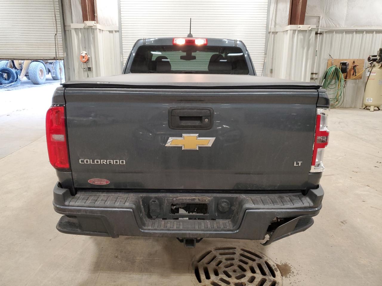 2015 Chevrolet Colorado VIN 1GCHTBE34F1137762 Copart auction photo, side / rear end damage thumbnail 6